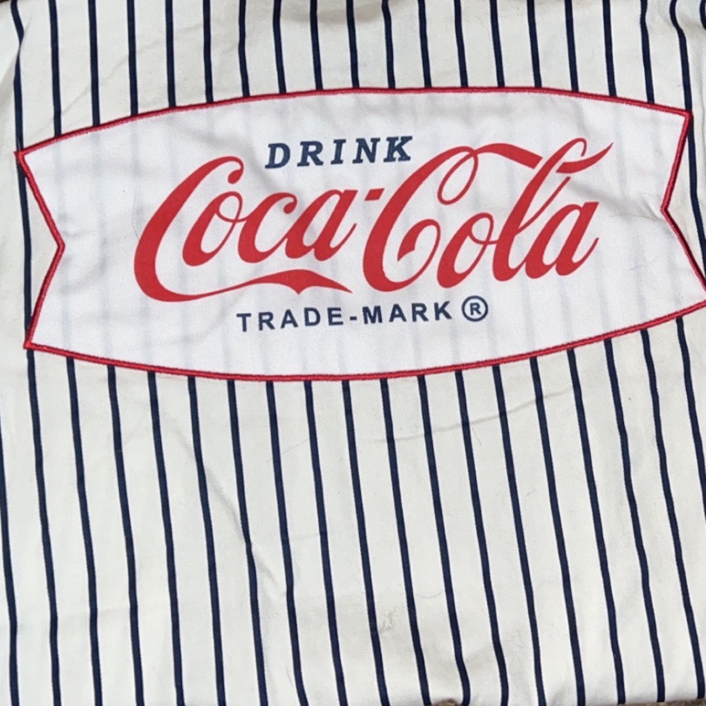Coca Cola button up top